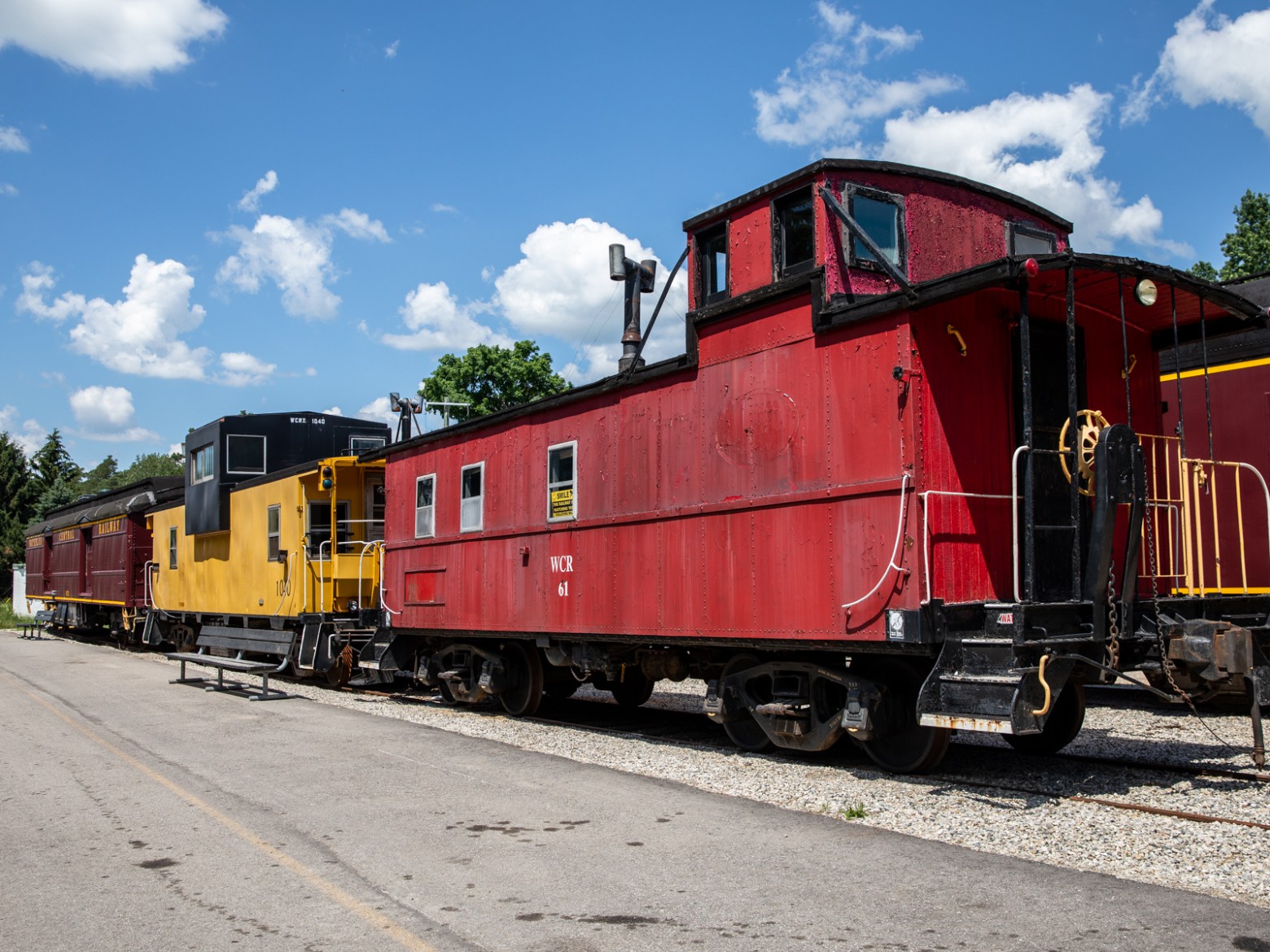 a train engine carrying carts down a track