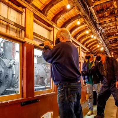 a man standing in front of a building