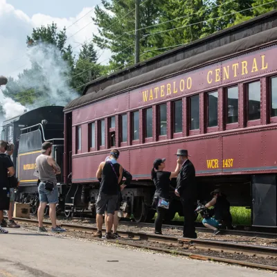 a group of people on a train track