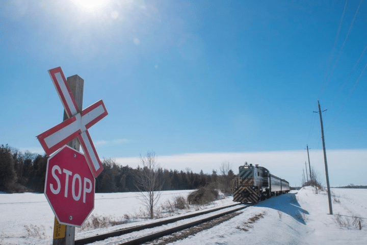 a stop sign is covered with snow