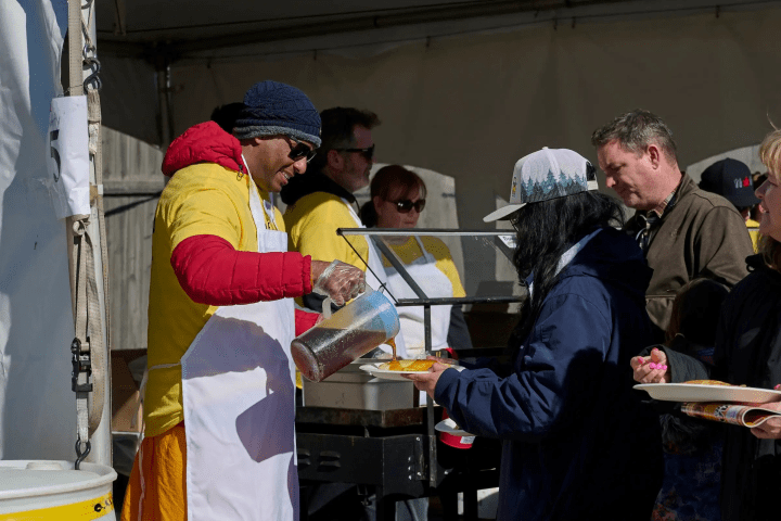 a group of people preparing food inside of it