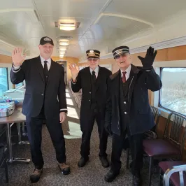 a group of people standing in a room