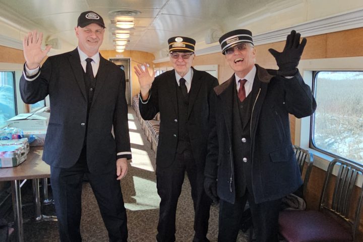 a group of people standing in a room