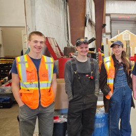 a group of people posing for the camera