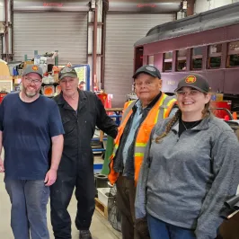 a group of people posing for the camera