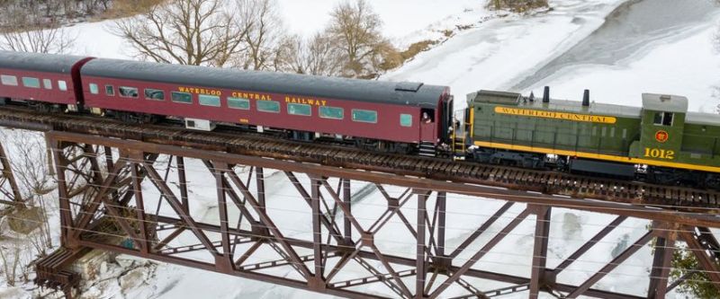 a large long train on a steel track