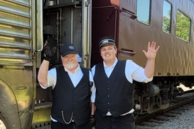 a person standing in front of a truck